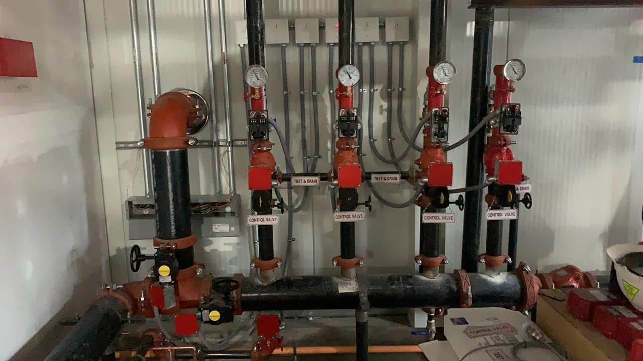 Hospital corridor with ceiling-mounted fire suppression